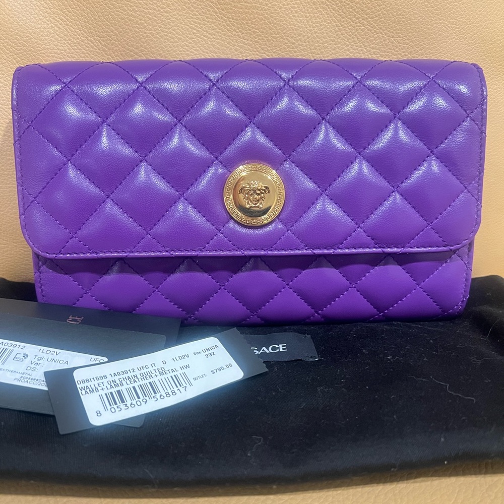 Versace Medusa quilted lamb leather clutch purse with chain.